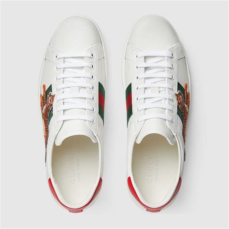 gucci tiger shoes fake|gucci tiger button up.